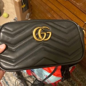 Black and gold Gucci